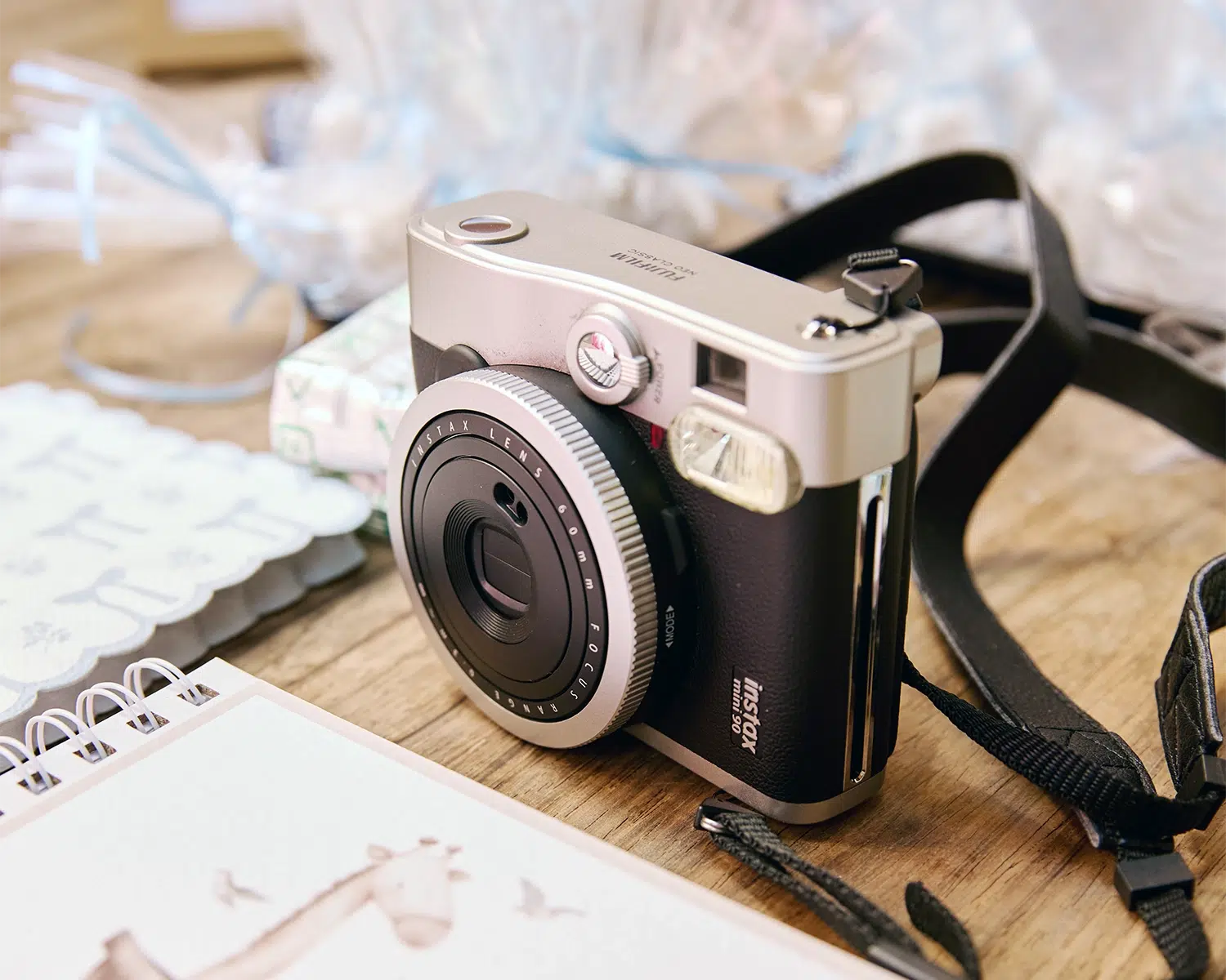 A vintage camera on a table at a christening.