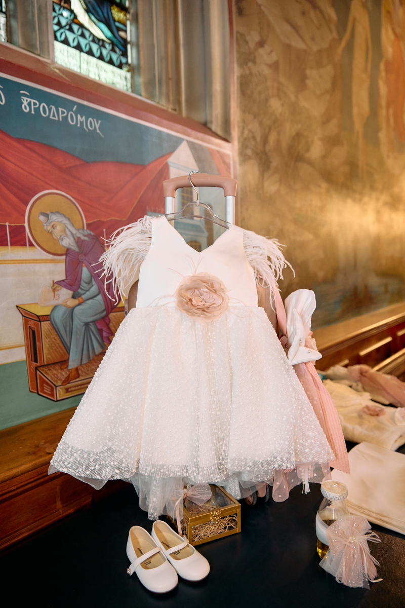 A baby's christening dress in a church.