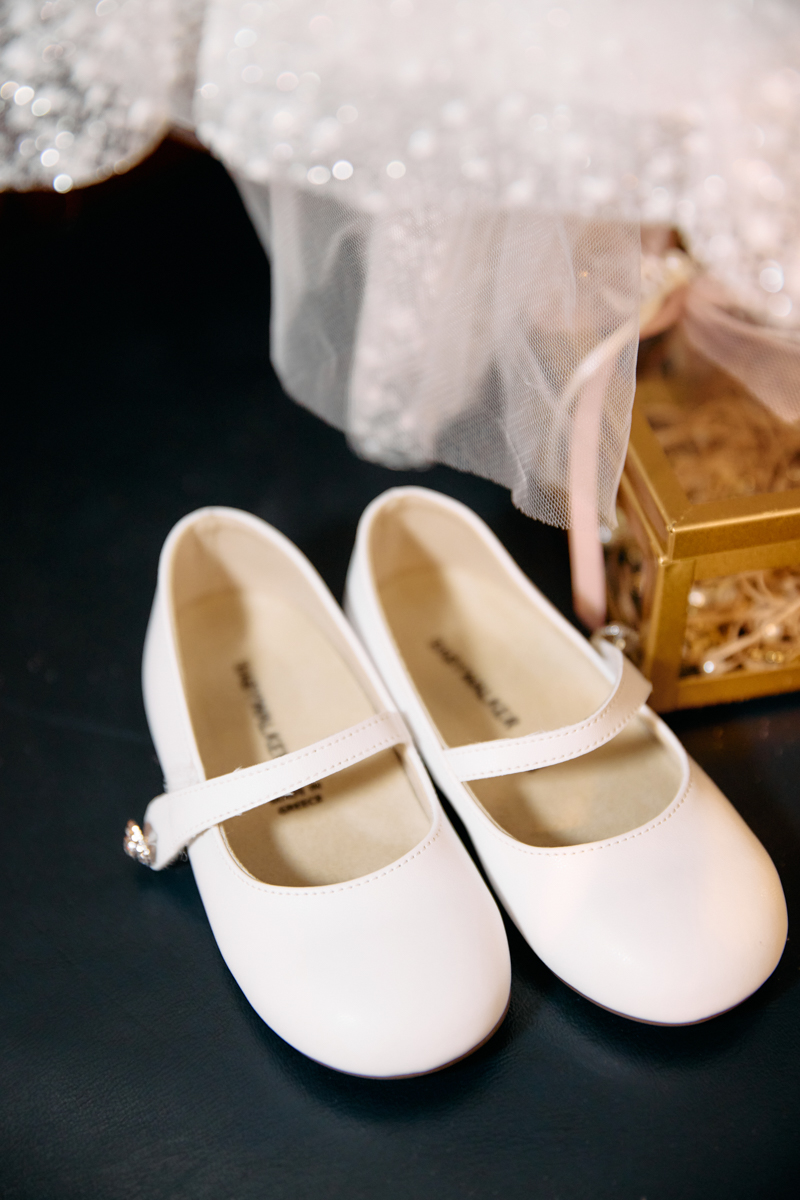 A baby's christenign shoes in a church.