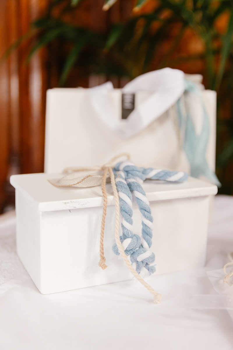 A box containing christening clothes.