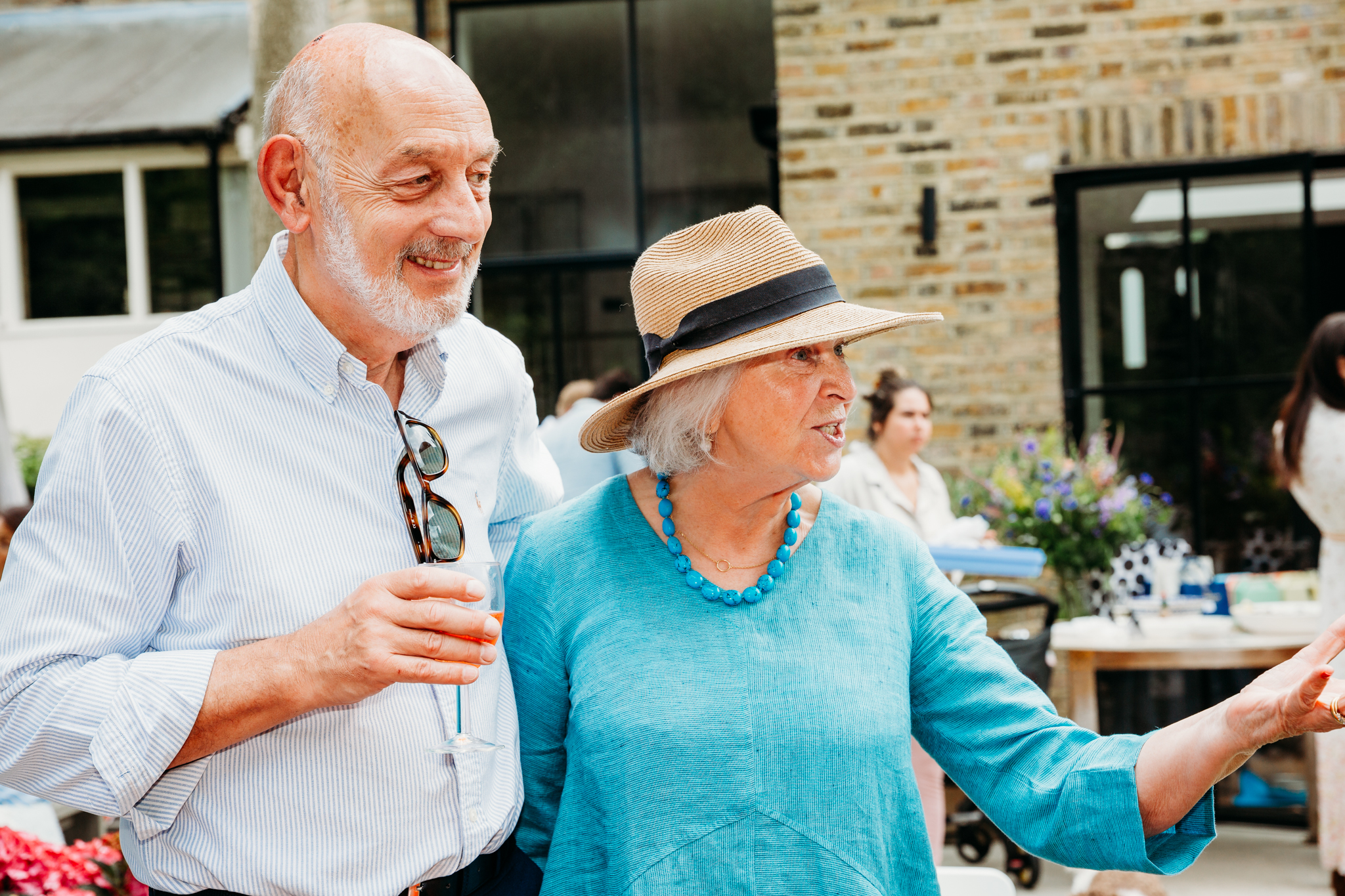 An elderly couple chatting.