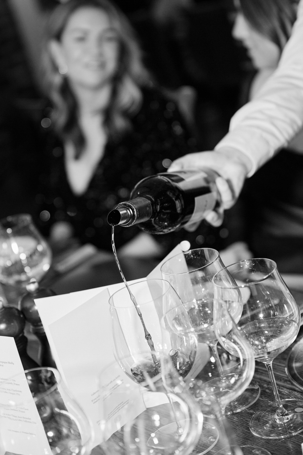 Red wine pouring in a glass.
