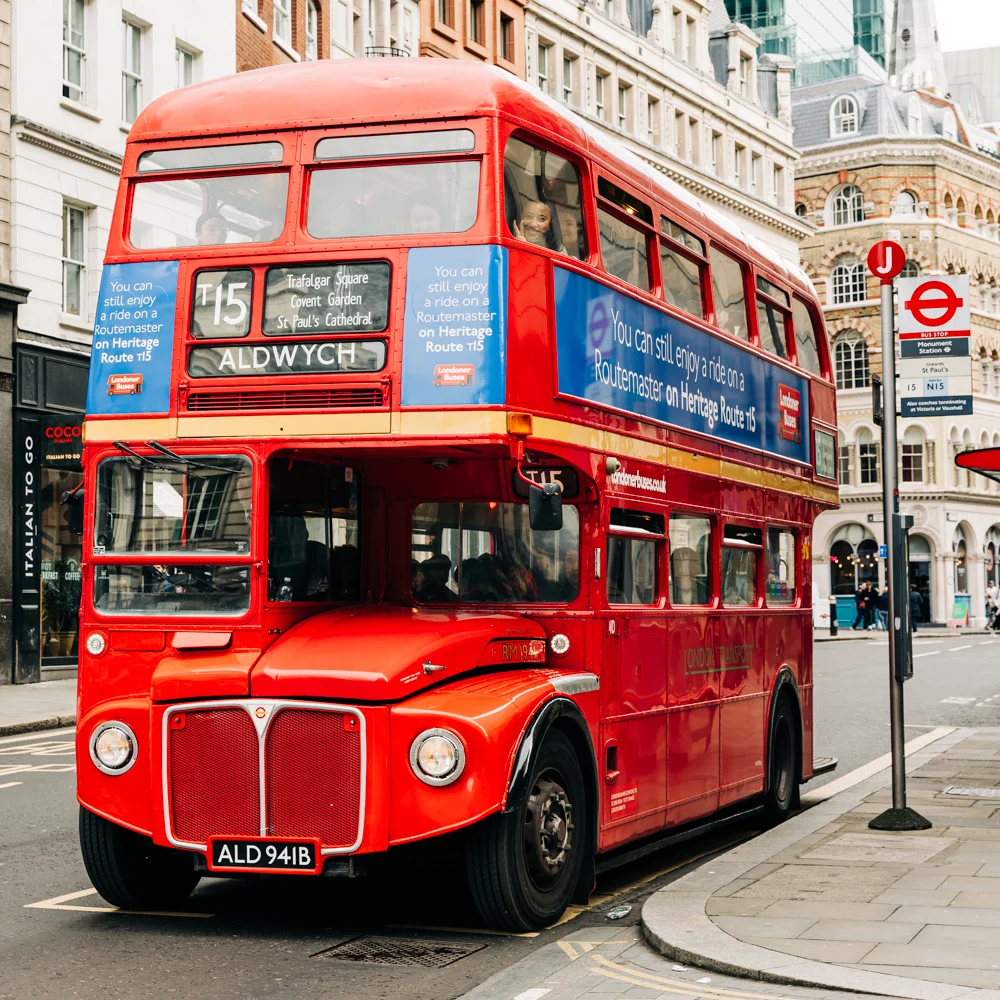 A vintage London bus in the streets of London.